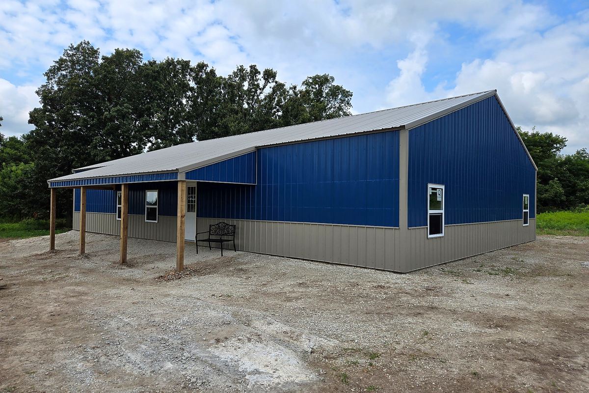Barndominium-style home with garage